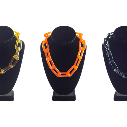 These are Glass Choker Chains by Technicolor Tony available at Handmade Glass Co. Handmade in Denver, Colorado this unique glass chain features subtle details for a statement jewelry piece.