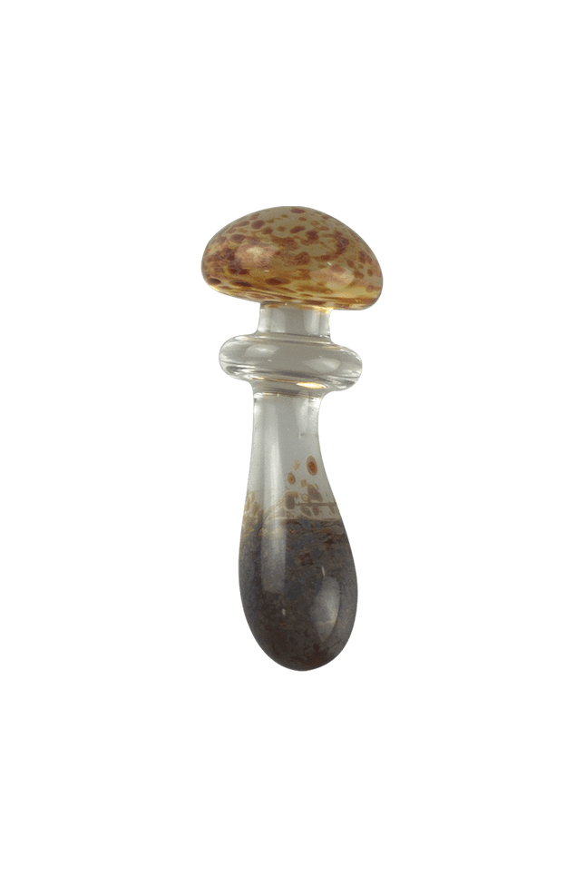 This is the Clear & Frit Mushroom Trinket by Technicolor Tony available at Handmade Glass Co. A fun glass trinket featuring an accented stem and cap with amber purple frit.