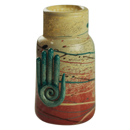 This is the Eternal Life Glass Jar by Maze Glass available at Handmade Glass Co. Featuring a cork stopper and Eternal Life pendant this is a one-of-a-kind glass jar.