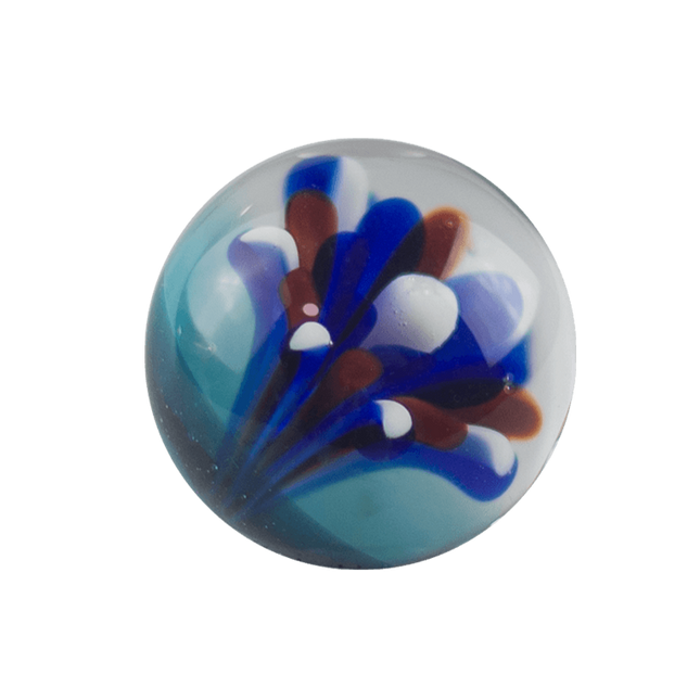 This is the Fireworks Marble by Biting Glass available at Handmade Glass Co. A fun red, white & blue handmade borosilicate glass marble backed by sparkly blue.