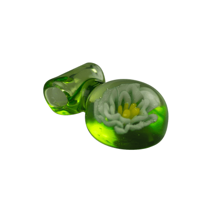 This is the Green Flower Medallion Pendant by Biting Glass available at Handmade Glass Co. A beautiful handmade borosilicate jewelry piece with hidden sparkly details. 