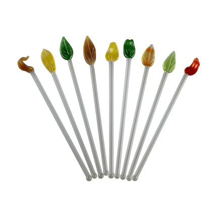 These are handmade Glass Leaf Cocktail Swizzle Sticks by Biting Glass available at Handmade Glass Co. Featuring vibrant glass leaf toppers and rounded bottom to easily stir up your favorite drink.