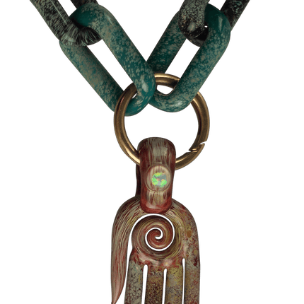 This is a collab glass chain necklace by Technicolor Tony & Maze Glass available at Handmade Glass Co. Made here in Denver and featuring accents from both artists this is a one-of-a-kind impressive glass masterpiece.