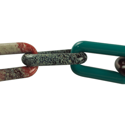 This is a collab glass chain necklace by Technicolor Tony & Maze Glass available at Handmade Glass Co. Made here in Denver and featuring accents from both artists this is a one-of-a-kind impressive glass masterpiece.