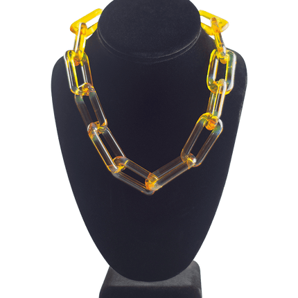 This is the Northstar Yellow Glass Choker Chain by Technicolor Tony available at Handmade Glass Co. Handmade in Denver, Colorado this unique glass chain features subtle details for a statement jewelry piece.
