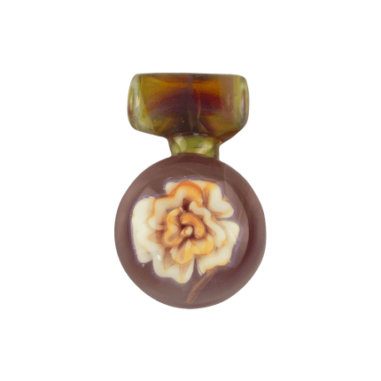 This is the Purple Rainbow Flower Medallion Pendant by Biting Glass available at Handmade Glass Co. A beautiful handmade borosilicate jewelry piece.