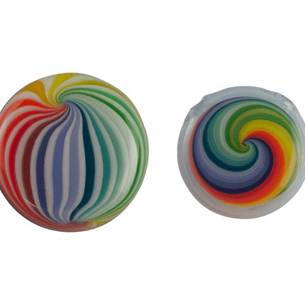 These are Rainbow Disc Pendants from Technicolor Tony available at Handmade Glass Co. The beautiful rainbow pendants makes for a fun jewelry piece and accessory!