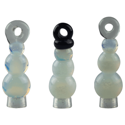 These are Snowman Ornaments by Biting Glass available at Handmade Glass Co. These fun seasonal ornaments also work as pendants and feature vibrant glass colors.