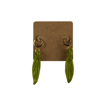 These are Leaf Dangle Earrings by Technicolor Tony available at Handmade Glass Co. Featuring vibrant glass leaves on gold hardware and made locally here in Denver.